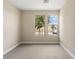 Well-lit bedroom with two windows and carpet flooring at 9911 Spinel Pl, Las Vegas, NV 89143