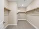 Large walk-in closet with double hanging rods at 9911 Spinel Pl, Las Vegas, NV 89143