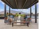 Relaxing community patio furniture with mountain views at 9911 Spinel Pl, Las Vegas, NV 89143