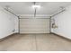 Attached garage with automatic door opener at 9911 Spinel Pl, Las Vegas, NV 89143