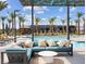 Comfortable seating area overlooking the refreshing pool at 9911 Spinel Pl, Las Vegas, NV 89143