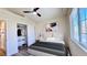 Bedroom with walk-in closet and wood-look floors at 10173 Grants Arbor Rd, Las Vegas, NV 89183