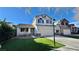 Two-story house with artificial turf lawn and brick facade at 10173 Grants Arbor Rd, Las Vegas, NV 89183