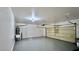 Spacious garage with automatic door opener and utility sink at 10173 Grants Arbor Rd, Las Vegas, NV 89183