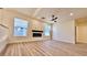 Bright living room featuring a fireplace and hardwood floors at 10173 Grants Arbor Rd, Las Vegas, NV 89183