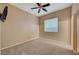 Simple bedroom with ceiling fan and window blinds at 10290 Hawks Wing St, Las Vegas, NV 89178