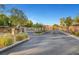 Gated community entrance with security access at 10290 Hawks Wing St, Las Vegas, NV 89178