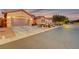 Attractive home with a 2-car garage and desert landscaping at 10290 Hawks Wing St, Las Vegas, NV 89178