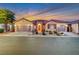 Beautiful desert home with a 3-car garage and landscaped yard at 10290 Hawks Wing St, Las Vegas, NV 89178