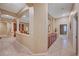 Long hallway with built-in cabinets and views into living area at 10290 Hawks Wing St, Las Vegas, NV 89178