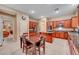 Spacious kitchen with granite countertops and stainless steel appliances at 10290 Hawks Wing St, Las Vegas, NV 89178