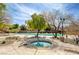 Relaxing community spa surrounded by trees at 10290 Hawks Wing St, Las Vegas, NV 89178