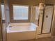 Bathroom with bathtub and shower at 10488 Beckaville Ave, Las Vegas, NV 89129