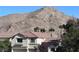 Two-story house with mountain views and a landscaped yard at 10488 Beckaville Ave, Las Vegas, NV 89129