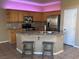 Kitchen with granite countertops, stainless steel appliances, and island at 10488 Beckaville Ave, Las Vegas, NV 89129