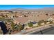 Aerial view of houses with mountain backdrop at 10499 Skye Paseo Ave, Las Vegas, NV 89166