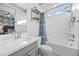 Clean bathroom with a bathtub, shower, and gray vanity at 10499 Skye Paseo Ave, Las Vegas, NV 89166