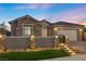 Stunning curb appeal with stone accents and gated entryway at 10499 Skye Paseo Ave, Las Vegas, NV 89166