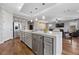 Kitchen island with seating and stainless steel appliances at 10499 Skye Paseo Ave, Las Vegas, NV 89166