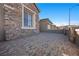 Exterior patio area with stone tile and a view of neighboring homes at 10499 Skye Paseo Ave, Las Vegas, NV 89166