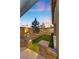 Landscaped backyard with artificial turf and stone accents at 10499 Skye Paseo Ave, Las Vegas, NV 89166