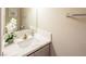 Updated bathroom with a quartz countertop and modern vanity at 114 Appian Way, Henderson, NV 89002