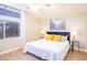 Spacious bedroom with a king-size bed and plenty of natural light at 114 Appian Way, Henderson, NV 89002