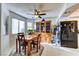 Bright dining area with wood table and hutch at 1205 Sulphur Springs Ln # 101, Las Vegas, NV 89128