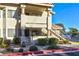 Condo exterior featuring a walkway, stairs, and landscaping at 1205 Sulphur Springs Ln # 101, Las Vegas, NV 89128