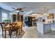 Modern kitchen with white cabinets and breakfast bar at 1205 Sulphur Springs Ln # 101, Las Vegas, NV 89128