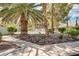 Landscaped courtyard with walkways and a view of the pool at 1205 Sulphur Springs Ln # 101, Las Vegas, NV 89128