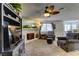 Living room with fireplace, seating area, and built-in shelving at 1205 Sulphur Springs Ln # 101, Las Vegas, NV 89128