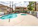 Community pool and spa area with surrounding landscaping at 1205 Sulphur Springs Ln # 101, Las Vegas, NV 89128