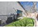 Small, grassy backyard with a privacy fence at 12169 Castilla Rain Ave, Las Vegas, NV 89138