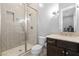 Bathroom with shower and dark brown vanity at 12169 Castilla Rain Ave, Las Vegas, NV 89138