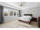 Bright bedroom with plantation shutters and ceiling fan at 12169 Castilla Rain Ave, Las Vegas, NV 89138