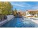 Luxury pool with spa and waterfall feature at 12169 Castilla Rain Ave, Las Vegas, NV 89138