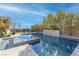 Resort-style pool with spa and waterfall feature at 12169 Castilla Rain Ave, Las Vegas, NV 89138