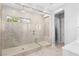 Walk-in shower with bench and glass enclosure at 12169 Castilla Rain Ave, Las Vegas, NV 89138