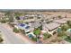 Aerial view of homes with pools, landscaping, and solar panels at 156 Ozuna Ct, Las Vegas, NV 89183