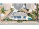 Bird's-eye view of a house with a pool, solar panels, and circular driveway at 156 Ozuna Ct, Las Vegas, NV 89183