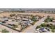 Aerial view of a residential neighborhood with houses, pools, and solar panels at 156 Ozuna Ct, Las Vegas, NV 89183