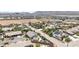 Aerial view of neighborhood homes, showcasing pools and solar panels at 156 Ozuna Ct, Las Vegas, NV 89183