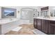 Spa-like bathroom with soaking tub and walk-in shower at 156 Ozuna Ct, Las Vegas, NV 89183