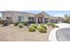 House exterior with stone accents and landscaping at 156 Ozuna Ct, Las Vegas, NV 89183