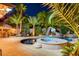 Expansive pool, spa, and waterslide in backyard at 156 Ozuna Ct, Las Vegas, NV 89183