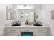 Modern bathroom with granite countertops and double sinks at 1713 Sequoia Dr, Henderson, NV 89014