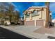 Beautiful two-story house with a three-car garage and well-maintained landscaping at 1713 Sequoia Dr, Henderson, NV 89014