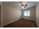 Bright bedroom with large window and ceiling fan at 1788 Amarone Way, Henderson, NV 89012