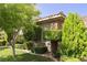 House exterior with stone facade and well-maintained landscaping at 1788 Amarone Way, Henderson, NV 89012